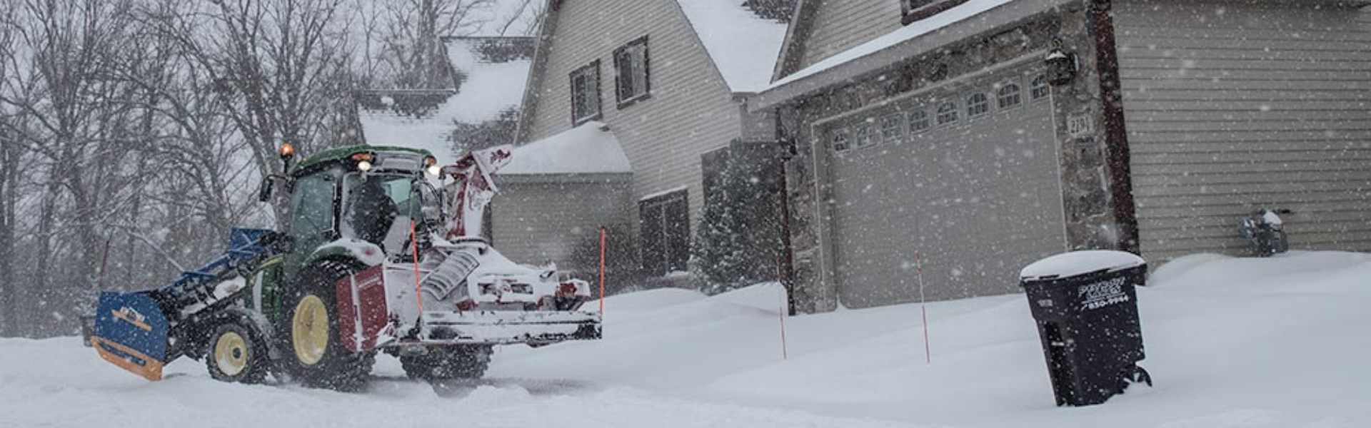 Miller Yard Care & Construction removing snow from a clients home in Minnesota.